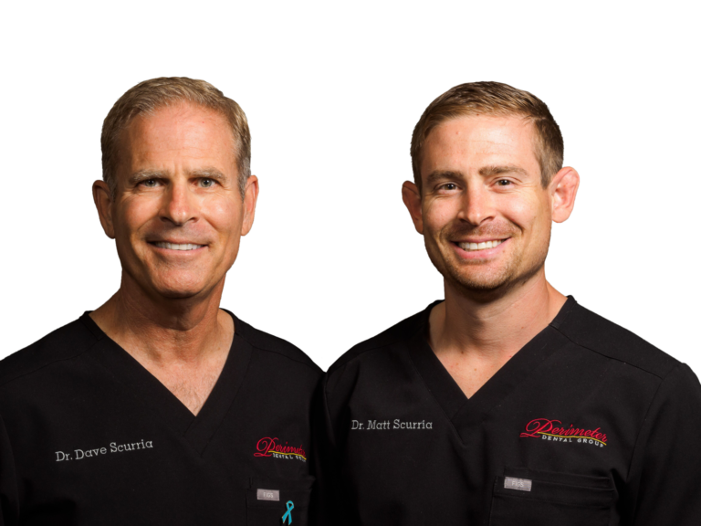 Doctors and owners of Perimeter Dental Group, Dave and Matt Scurria, smile side-by-side with a transparent background.